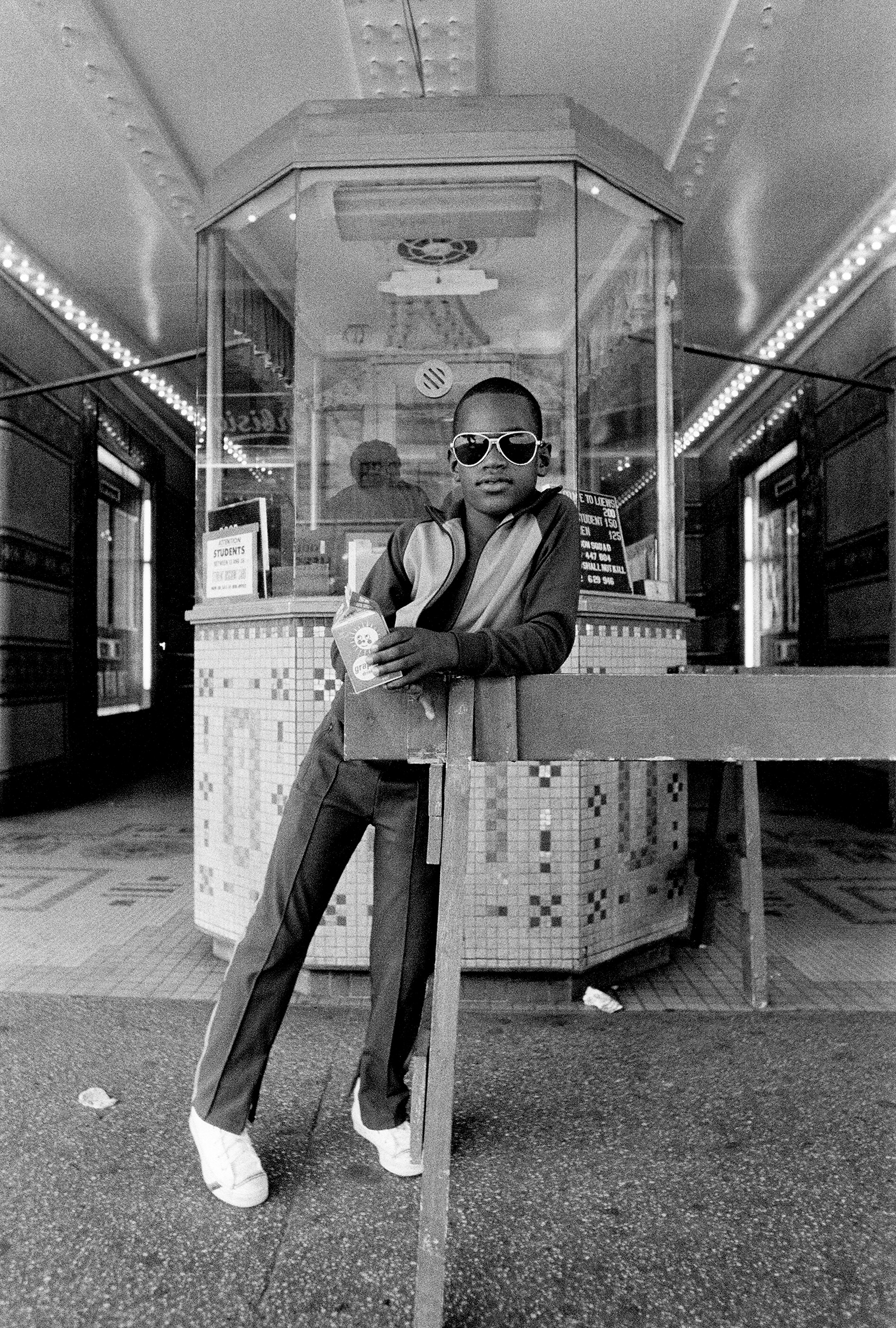 A Boy in Front of the Loew’s 125th Street Movie Theater, Harlem, NY, 1976