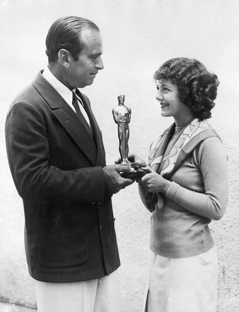 Douglas Fairbanks presents the first Oscar for Best Actress to Janet Gaynor
