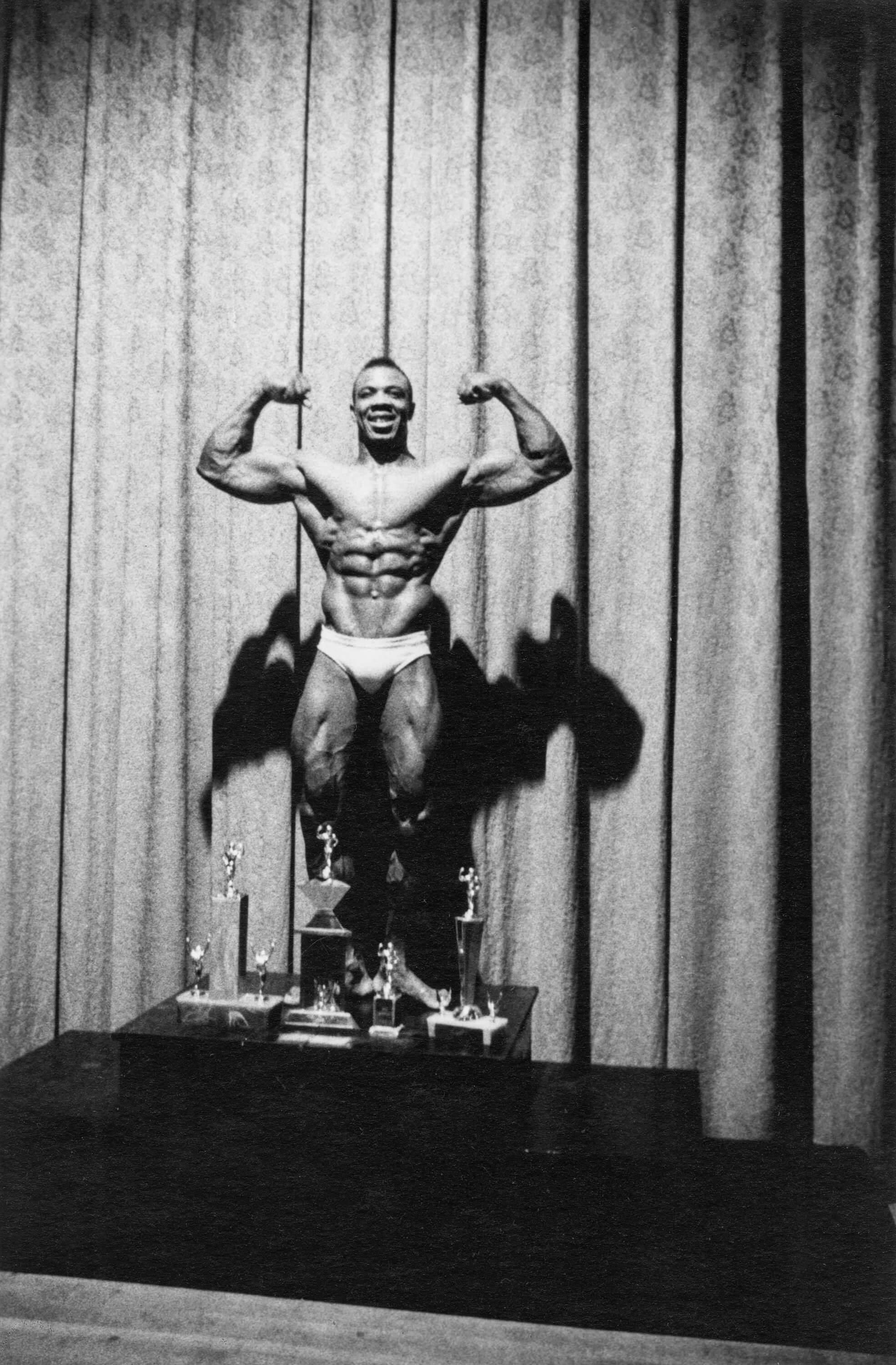 Kenneth Hall, the new Mr. New York City, at a physique contest, N.Y.C. 1959 gelatin silver print © The Estate of Diane Arbus