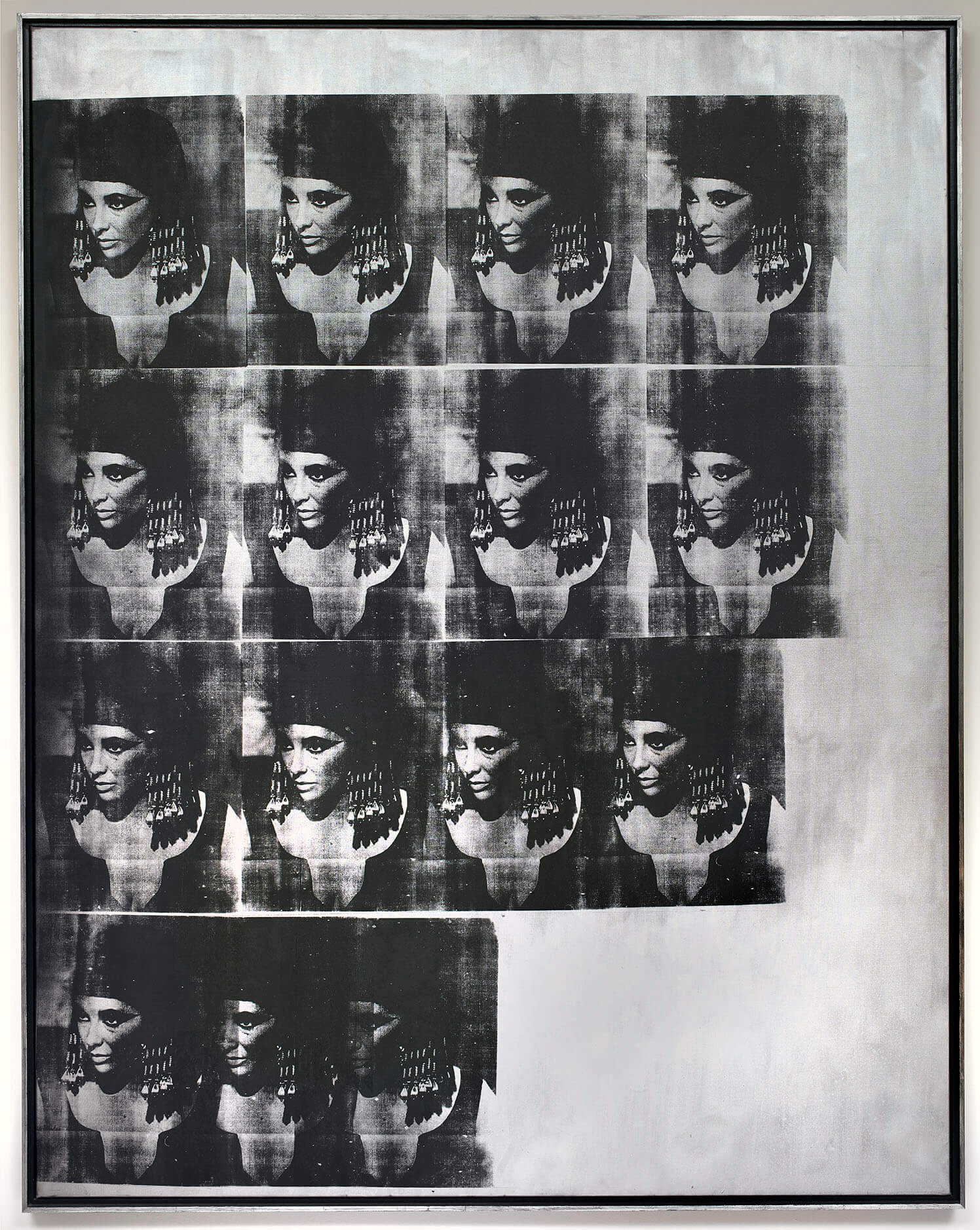 Andy Warhol. Silver Liz as Cleopatra, 1963. Silver paint, silkscreen ink, and pencil on linen, Framed: 212.4 × 169.5 cm. Art Gallery of Ontario. Gift of Mrs. Else Landauer, in memory of her husband, Walter Landauer, 1979. © 2021 The Andy Warhol Foundation for the Visual Arts, Inc / Licensed by Artists Rights Society (ARS), New York / SOCAN.