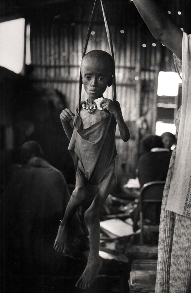 ETHIOPIAN GIRL CLUTCHES BISCUIT Shot by Ozier Mohammad