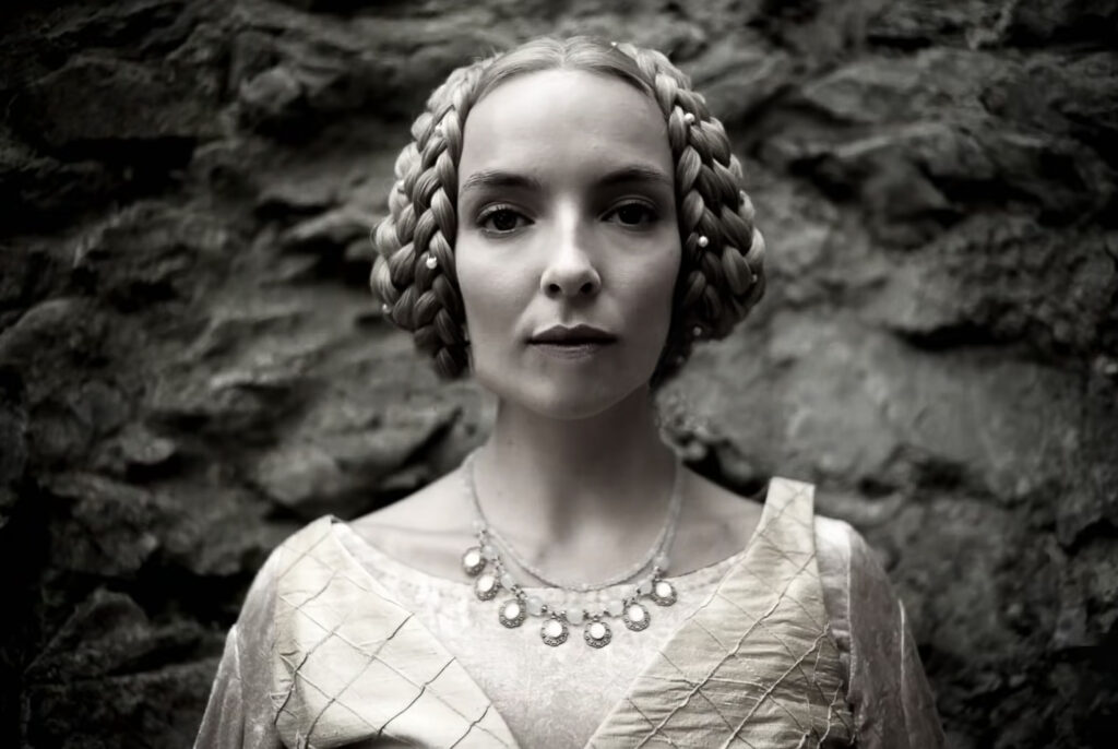 Jodie Comer as Marguerite de Carrouges in braids in the film The Last Duel