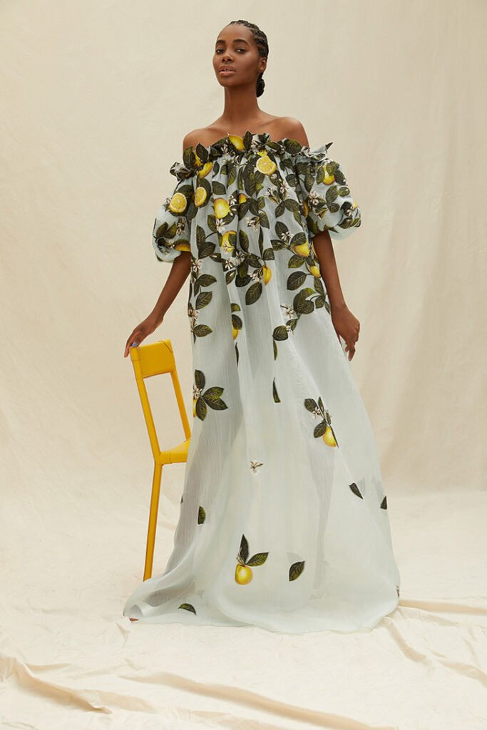 Oscar De La Renta Model wearing summer white dress with lemons rent the runway look