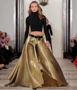 Ralph Lauren Collection Runway Model wearing Gold Flowing Skirt and Black Turteneck Cropped