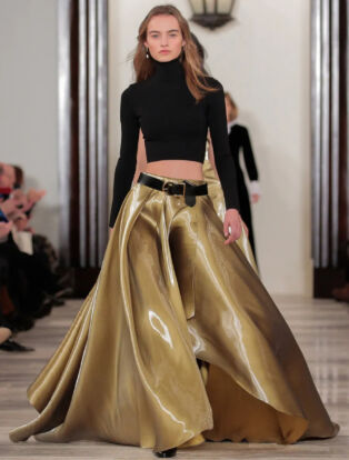 Ralph Lauren Collection Runway Model wearing Gold Flowing Skirt and Black Turteneck Cropped