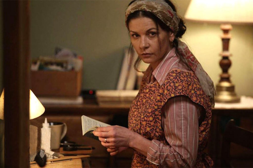 Cocaine Godmother Catherine Zeta Jones Holding a Book