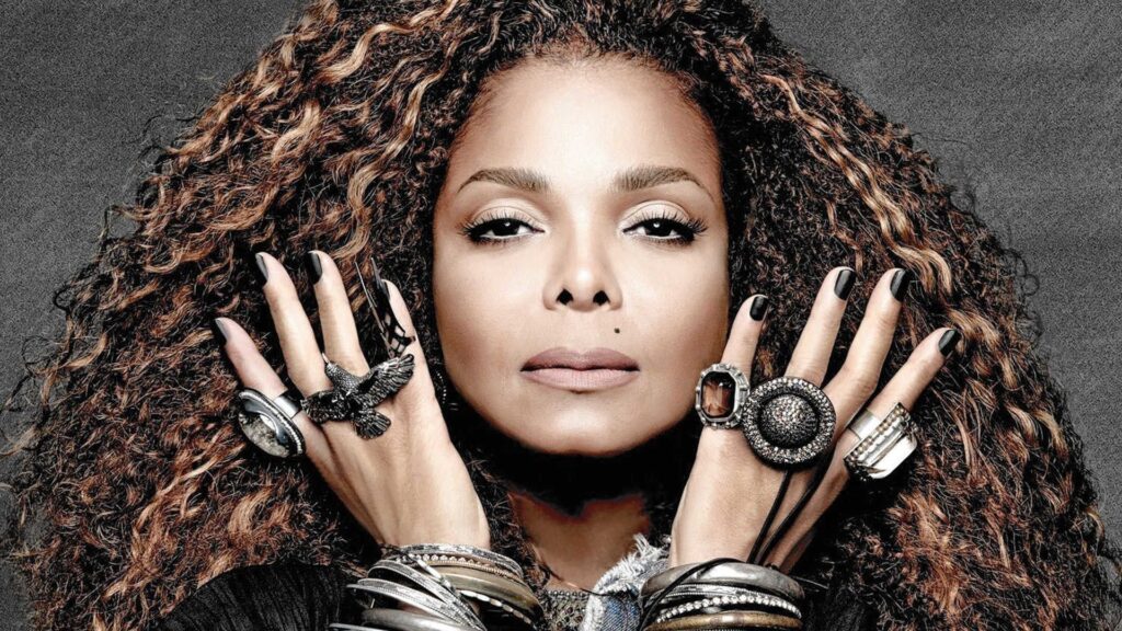 Janet Jackson Portrait with Hands Next Her Face and rings on each fingers