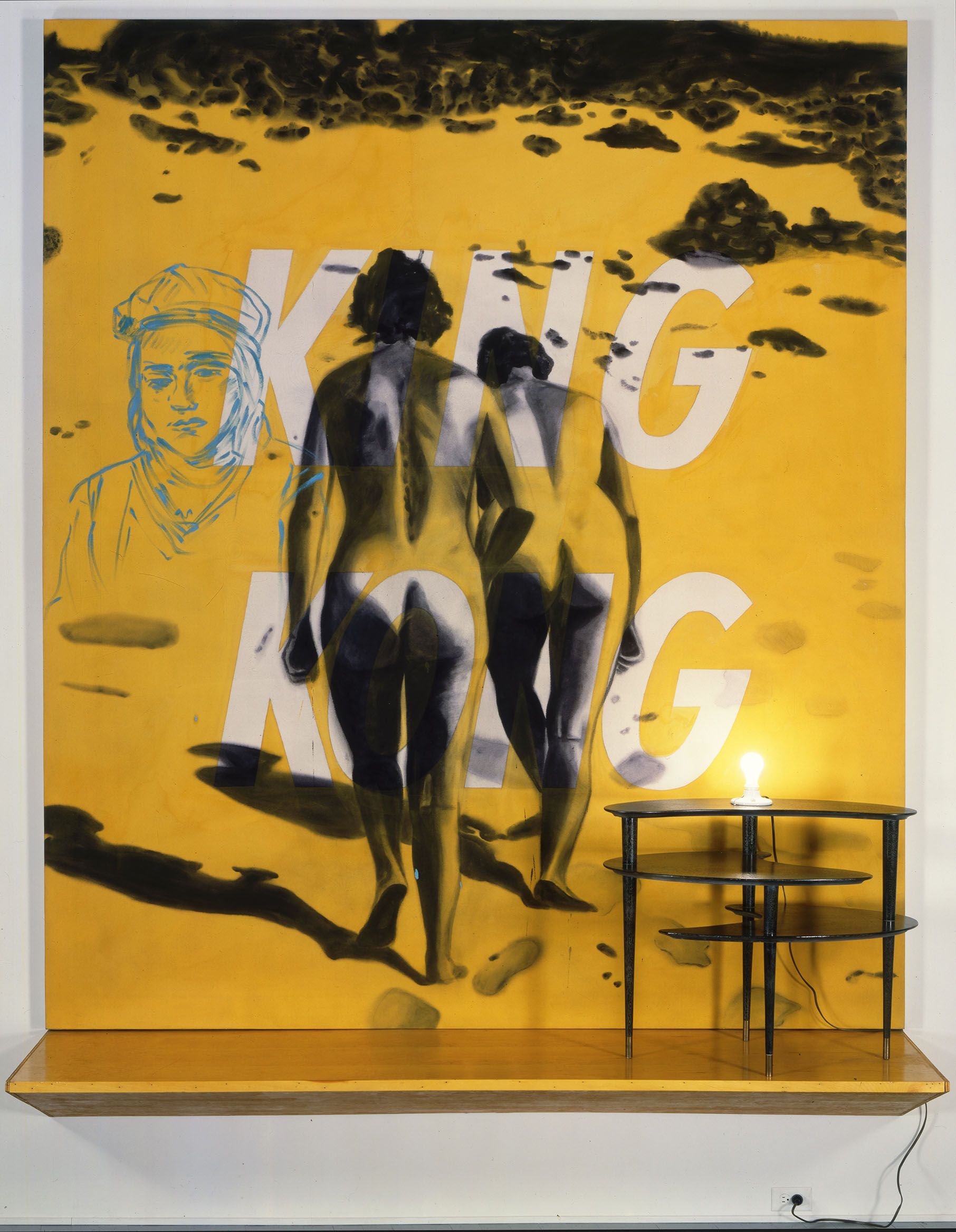 King Kong, 1983 oil and acrylic with electric light and wood table 123 x 96" © David Salle:VAGA at Artists Rights Society (ARS), New York. Courtesy The Brant Foundation, Greenwich, CT