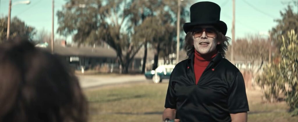 Ethan Hawke As the Killer Grabber wearing a top hat