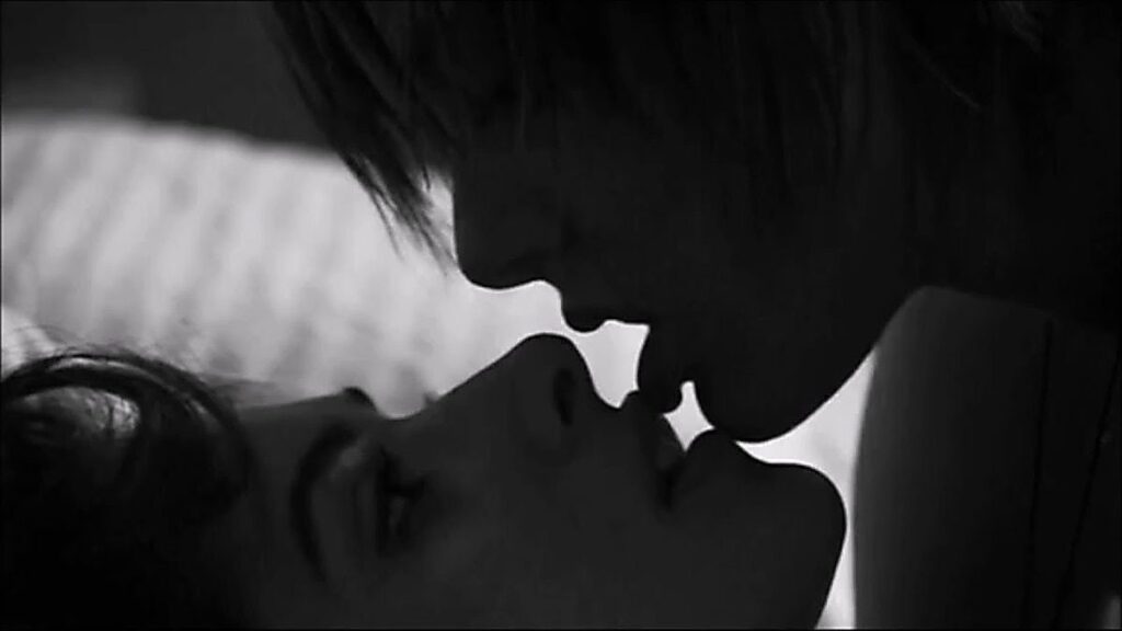 Shane and Carmen With Lips Touching Profile