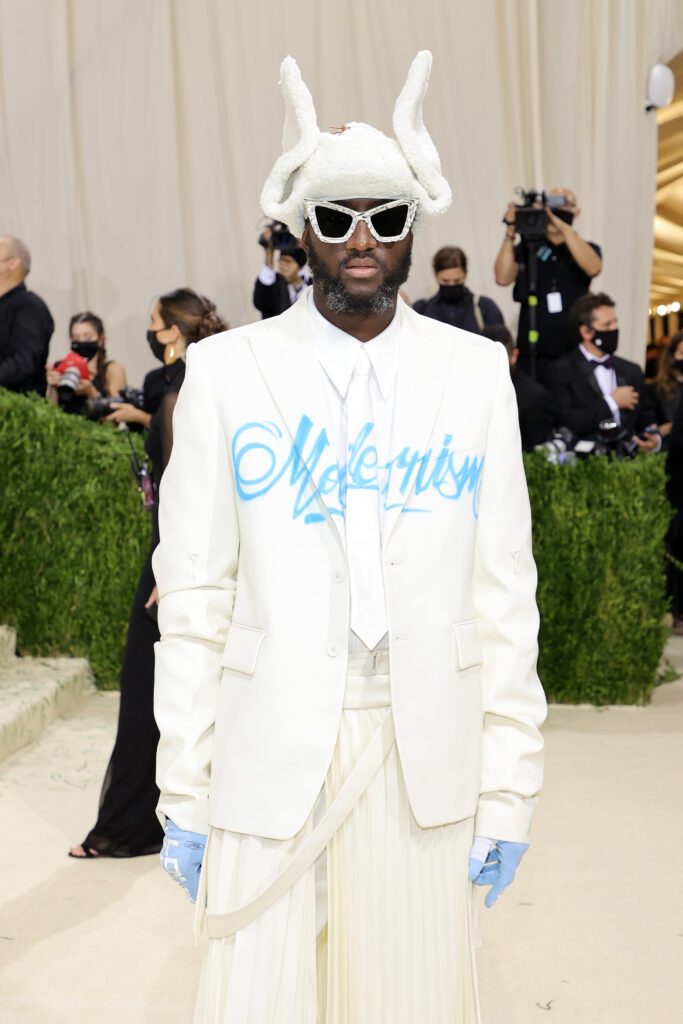 Virgil Abloh At The Met Ball Wearing White Hat Shades and Suit with Skirt
