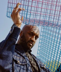 Virgil Abloh Holding Metal Crates