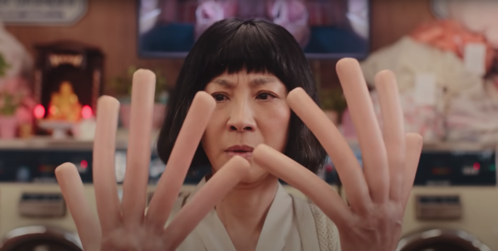 Michelle Yeo As Evelyn Wang Looking at her Abnormally Large Growing Fingers