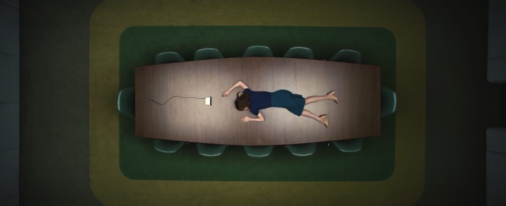Severance Starring Britt Lower As Helly Lying on Boardroom Table