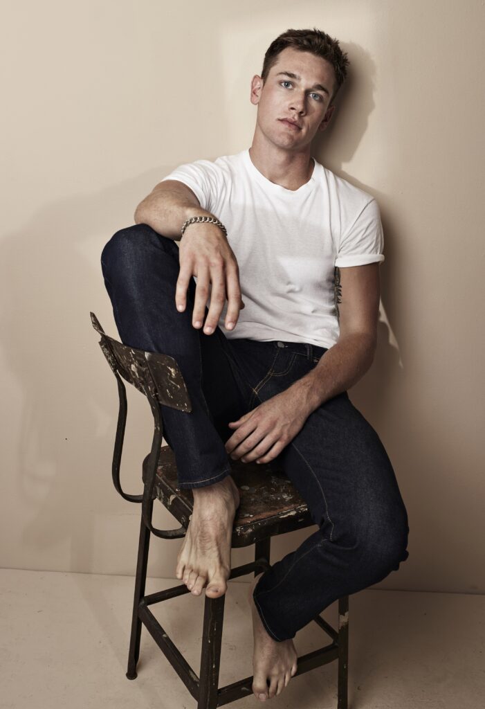 Taylor_John_Smith_t shirt jeans and barefoot