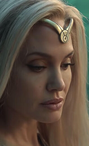 angelina-jolie-as thena in the eternals with blonde hair and gold headband
