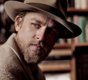 charlie hunnam Wearing a Brown Fedora