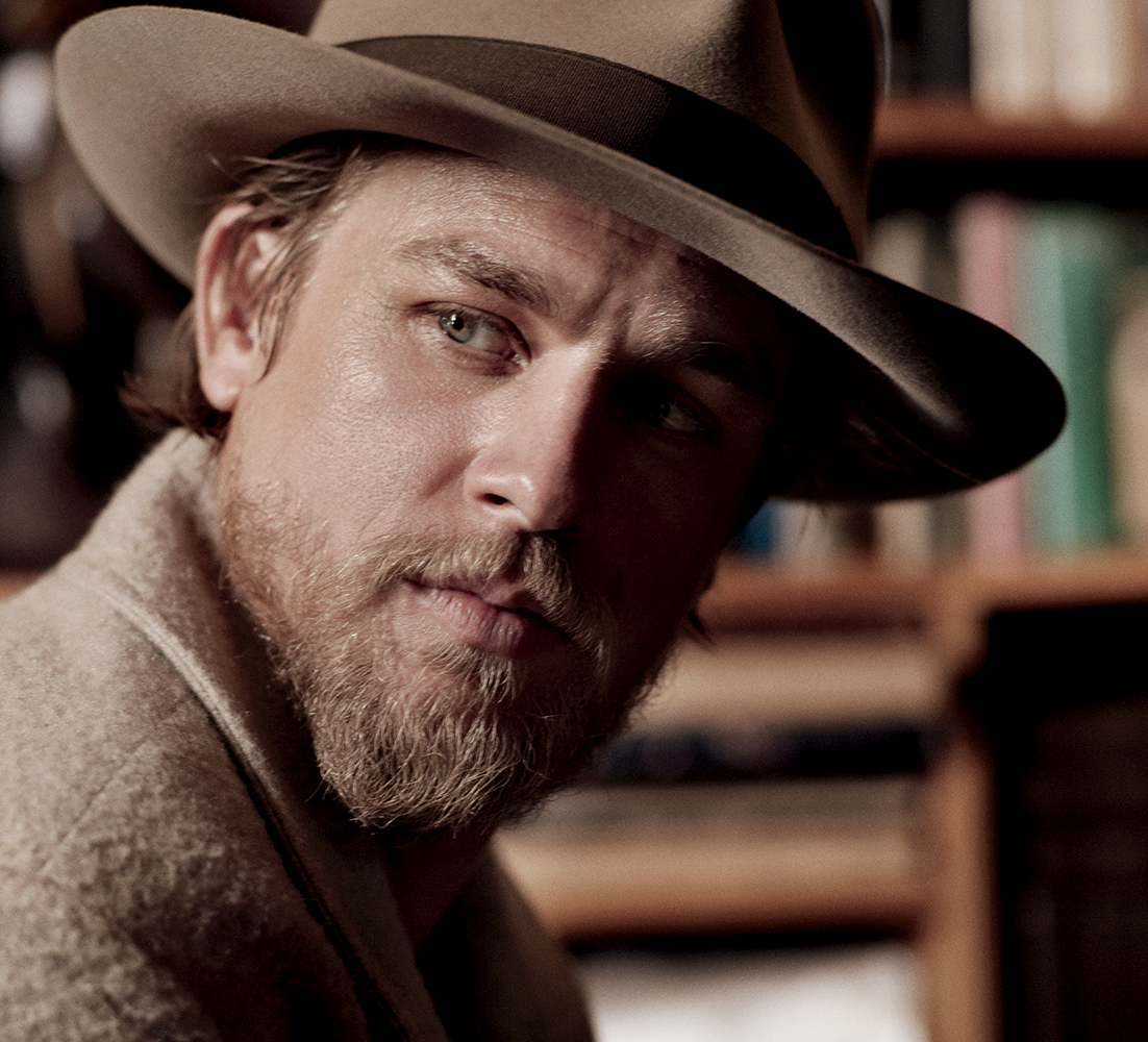 charlie hunnam Wearing a Brown Fedora