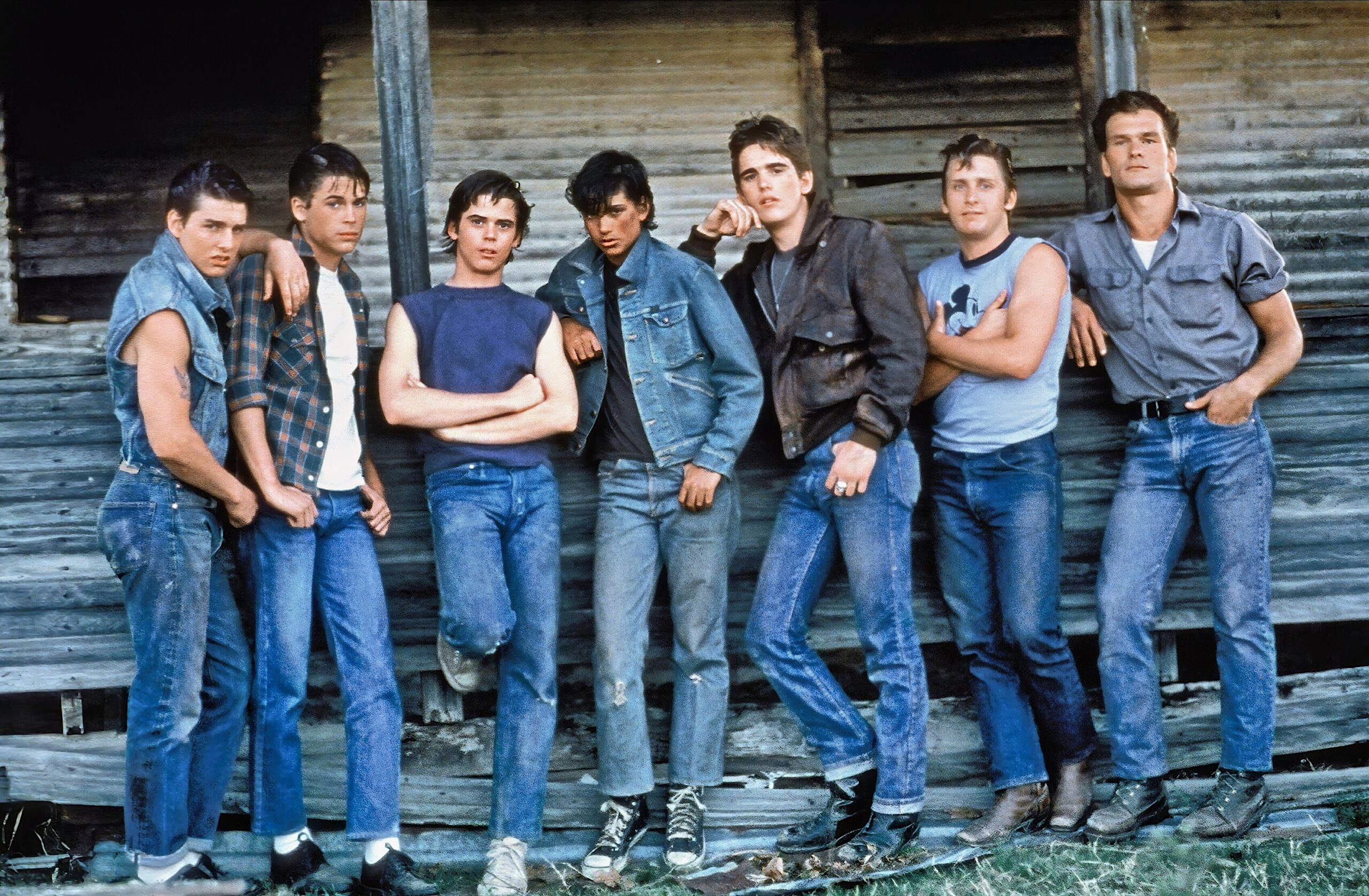 The Outsiders. From left_ Tom Cruise, Rob Lowe, C. Thomas Howell, Ralph Macchio, Matt Dillon, Emilio Estevez, Patrick Swayze. Alamy